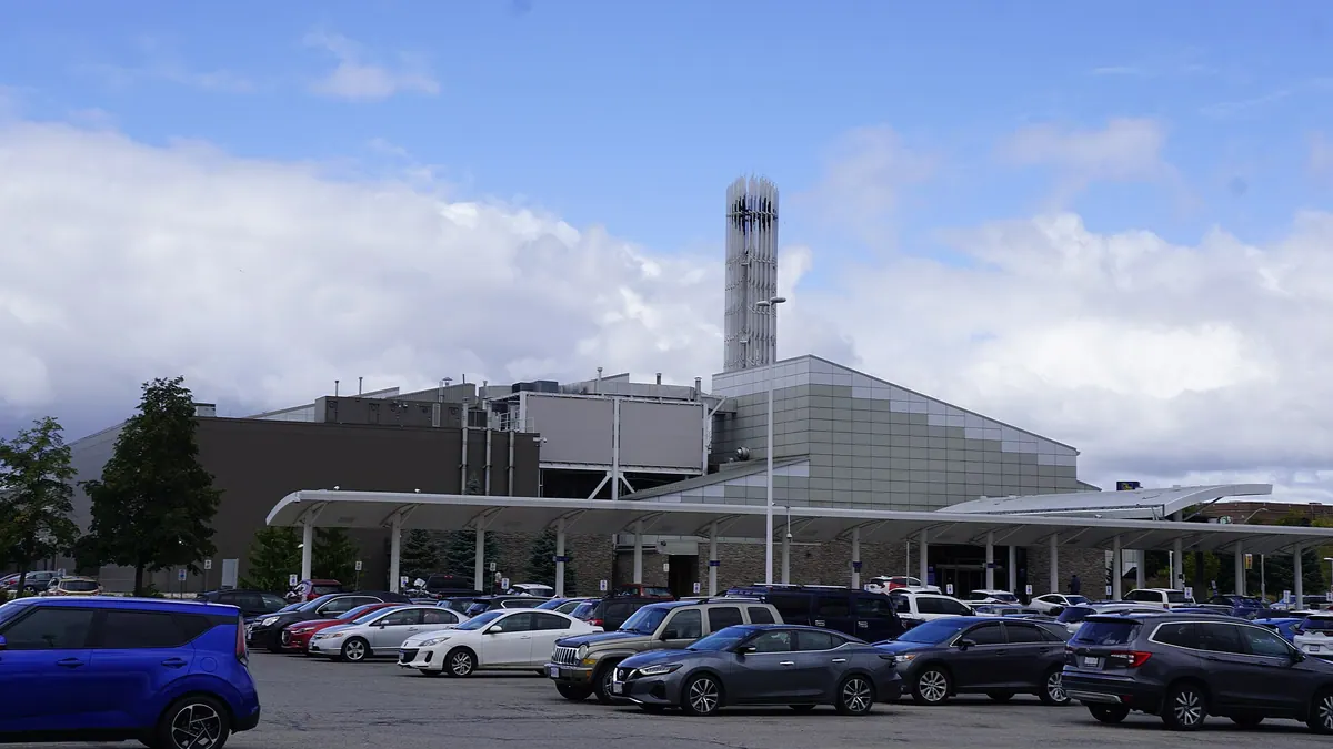 Elements Casino Brantford by day, the low casino building with its white entrance canopy